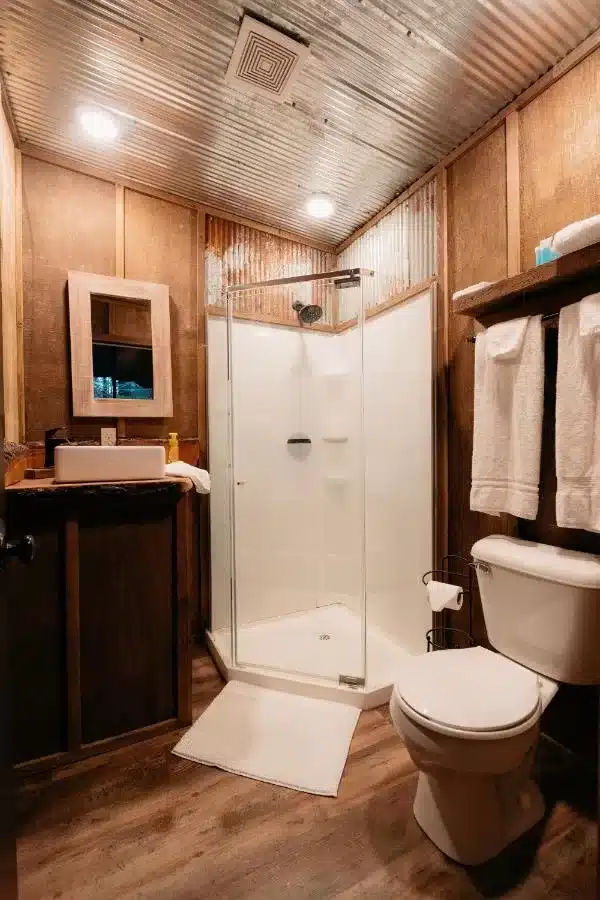 Shower and Bathroom in Glamping Treehouse in Branson